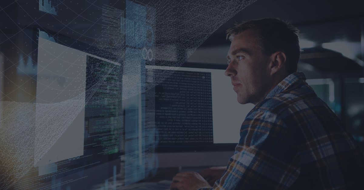 Man typing lines of code on computer with a transparent dotted waves pattern overlayed in front