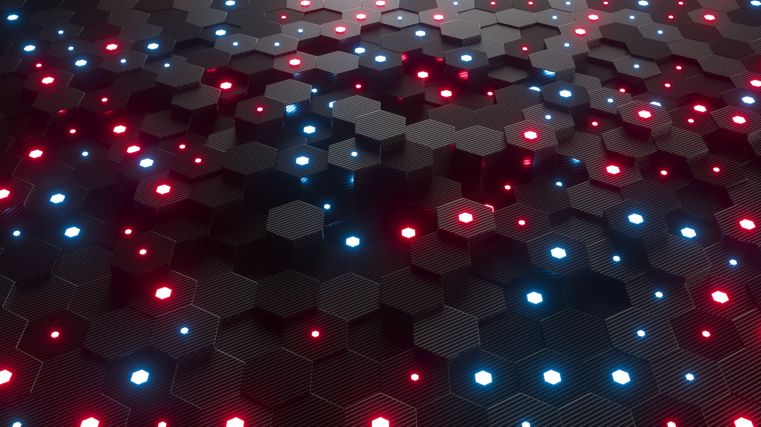 A close-up image of a textured surface with a hexagonal pattern illuminated by red and blue led lights, creating a vibrant, futuristic effect.