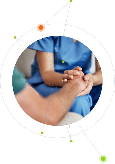 Two people holding hands for comfort in a healthcare setting, with a soft focus on the hands and a lightly blurred background. A graphic overlay of connected dots and lines suggests themes of security and network.